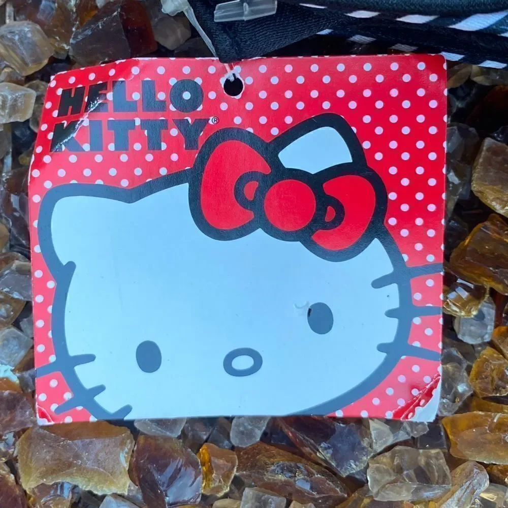 Hello Kitty Sanrio Black and White Chevron Print Satin Clutch. New w/tag (NWT).
